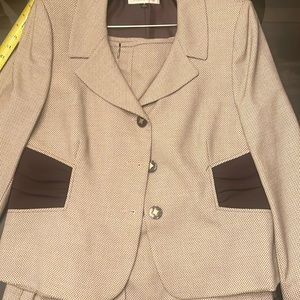 Brown beauty, knockout, two piece suit. Never worn.